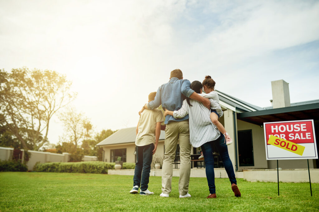 Im moving my family into our dream home - Joint Path Mortgage LLC - Home Loans & Refinancing Family admiring new home with HomeReady Loan from Joint Path Mortgage LLC.